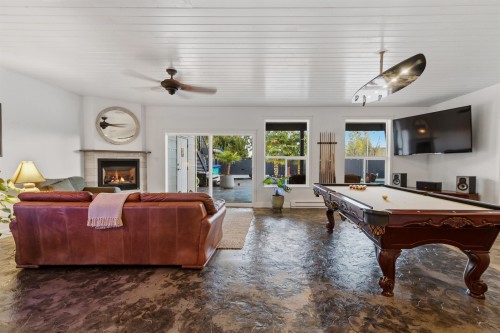 6369 Jasper Road, Sechelt, BC - Indoor Photo Showing Other Room With Fireplace