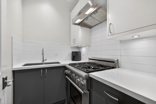 1850 36Th Avenue W, Vancouver, BC - Indoor Photo Showing Kitchen With Double Sink