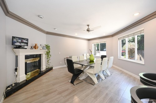 6339 Canada Way, Burnaby, BC - Indoor Photo Showing Dining Room With Fireplace