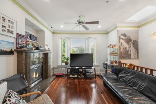 3054 5Th Avenue E, Vancouver, BC - Indoor Photo Showing Living Room With Fireplace