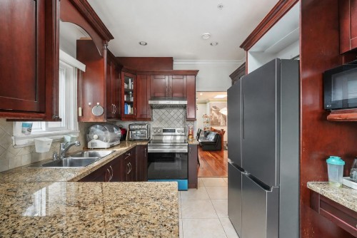 3054 5Th Avenue E, Vancouver, BC - Indoor Photo Showing Kitchen With Double Sink