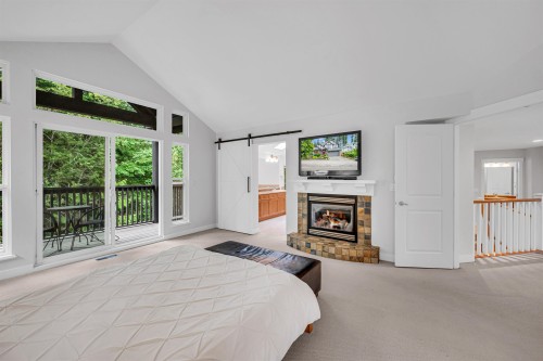 78 Cliffwood Drive, Port Moody, BC - Indoor Photo Showing Bedroom With Fireplace