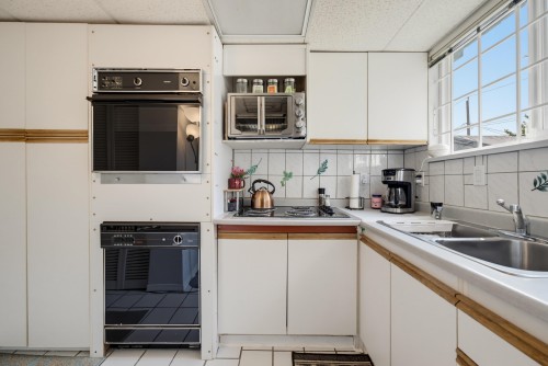 3575 Coast Meridian Road, Port Coquitlam, BC - Indoor Photo Showing Kitchen With Double Sink