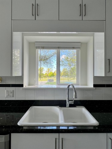 1808 51St Avenue E, Vancouver, BC - Indoor Photo Showing Kitchen With Double Sink