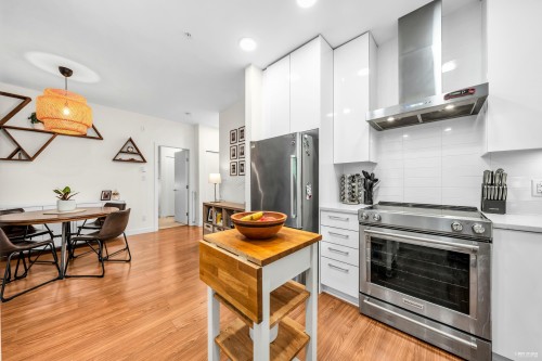 201-5460 Broadway, Burnaby, BC - Indoor Photo Showing Kitchen With Stainless Steel Kitchen With Upgraded Kitchen