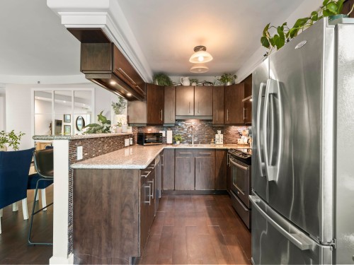 102-2528 Broadway E, Vancouver, BC - Indoor Photo Showing Kitchen With Upgraded Kitchen