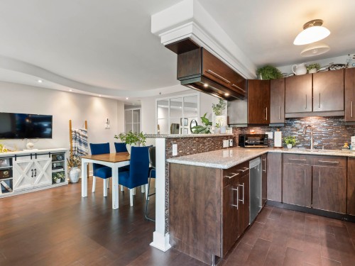 102-2528 Broadway E, Vancouver, BC - Indoor Photo Showing Kitchen With Double Sink