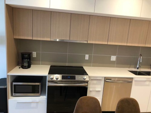 601-9888 University Crescent, Burnaby, BC - Indoor Photo Showing Kitchen With Double Sink