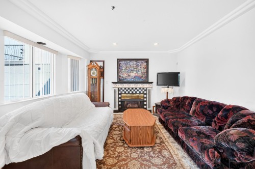 3423 24Th Avenue E, Vancouver, BC - Indoor Photo Showing Living Room With Fireplace