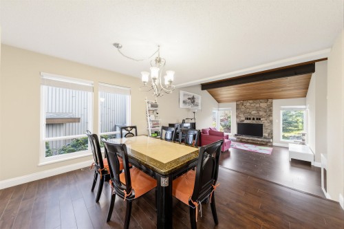 7763 Hazelmere Street, Burnaby, BC - Indoor Photo Showing Dining Room With Fireplace