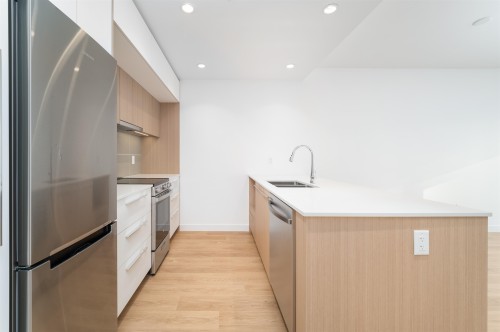 214-9888 University Crescent, Burnaby, BC - Indoor Photo Showing Kitchen With Stainless Steel Kitchen With Double Sink With Upgraded Kitchen
