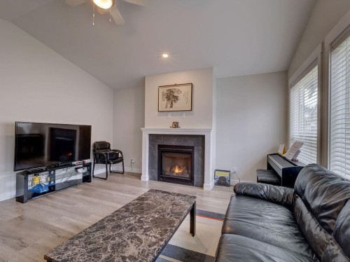 1028 Celia Crescent, Gibsons, BC - Indoor Photo Showing Living Room With Fireplace