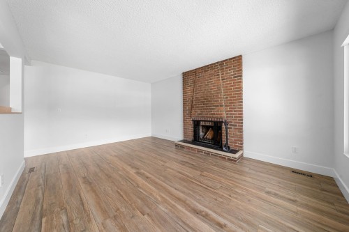 1231 River Drive, Coquitlam, BC - Indoor Photo Showing Living Room With Fireplace