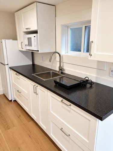 4147 W13th Ave , Vancouver, BC V6R 2T5 5