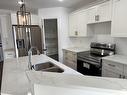 1711A Crestview Way, Cold Lake, AB  - Indoor Photo Showing Kitchen With Double Sink 