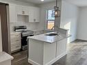 1711A Crestview Way, Cold Lake, AB  - Indoor Photo Showing Kitchen With Double Sink 