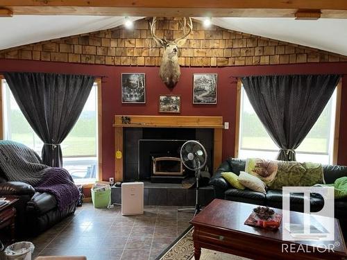 65060 Twp Rd 620, Rural Woodlands County, AB - Indoor Photo Showing Living Room With Fireplace