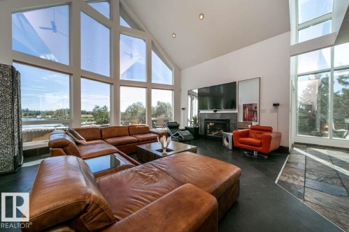 1730 Ellerslie Road Sw, Edmonton, AB - Indoor Photo Showing Living Room With Fireplace