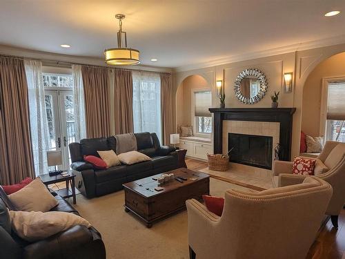 4337 49 Street, Vegreville, AB - Indoor Photo Showing Living Room With Fireplace