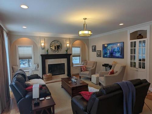 4337 49 Street, Vegreville, AB - Indoor Photo Showing Living Room With Fireplace