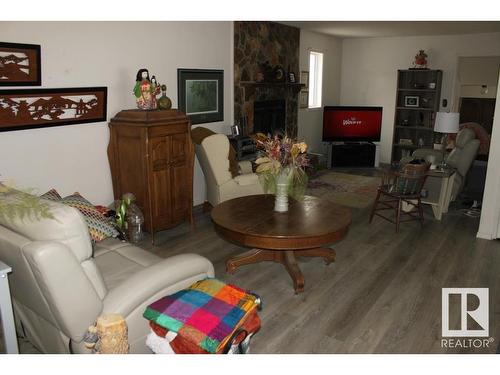 4335 53 Avenue, Tofield, AB - Indoor Photo Showing Living Room With Fireplace