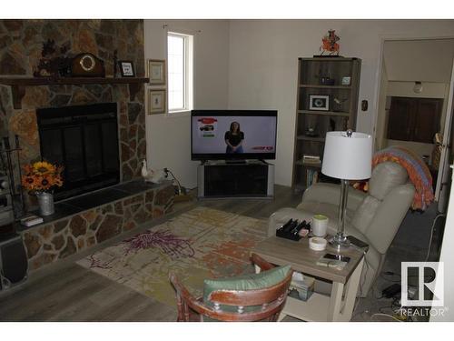 4335 53 Avenue, Tofield, AB - Indoor Photo Showing Living Room With Fireplace