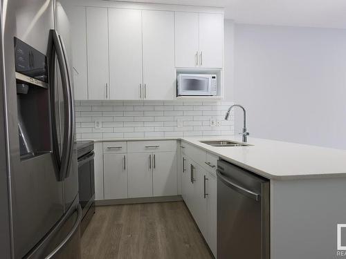 9919 227 Street, Edmonton, AB - Indoor Photo Showing Kitchen With Stainless Steel Kitchen With Double Sink With Upgraded Kitchen