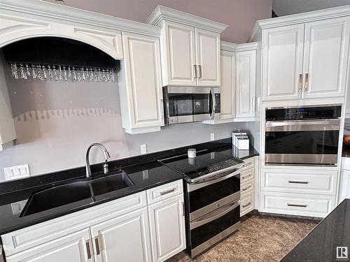 2 59327 Rge Rd 263, Rural Westlock County, AB - Indoor Photo Showing Kitchen With Double Sink