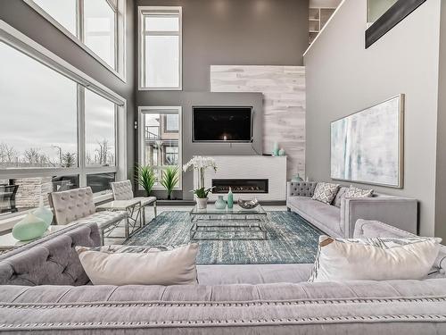 4129 Cameron Heights Point(E), Edmonton, AB - Indoor Photo Showing Living Room With Fireplace