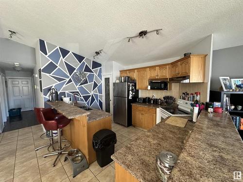 9637/9635 109A Avenue, Edmonton, AB - Indoor Photo Showing Kitchen With Double Sink