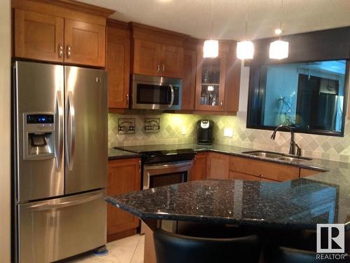 223 10142 111 Street Nw, Edmonton, AB - Indoor Photo Showing Kitchen With Double Sink With Upgraded Kitchen