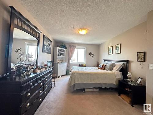 202 240 Spruce Ridge Road, Spruce Grove, AB - Indoor Photo Showing Bedroom