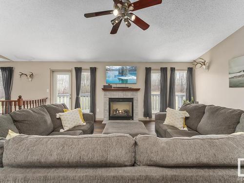 220 61209 Range Road 465, Rural Bonnyville M.D., AB - Indoor Photo Showing Living Room With Fireplace