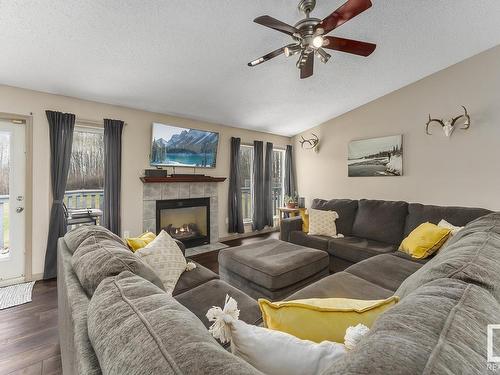 220 61209 Range Road 465, Rural Bonnyville M.D., AB - Indoor Photo Showing Living Room With Fireplace