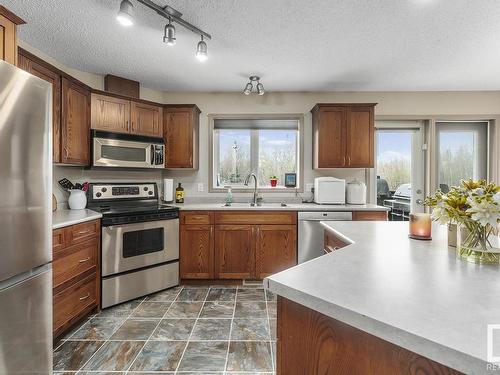 220 61209 Range Road 465, Rural Bonnyville M.D., AB - Indoor Photo Showing Kitchen With Stainless Steel Kitchen With Double Sink