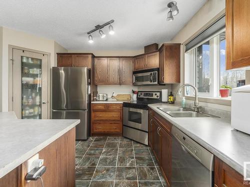 220 61209 Range Road 465, Rural Bonnyville M.D., AB - Indoor Photo Showing Kitchen With Stainless Steel Kitchen With Double Sink