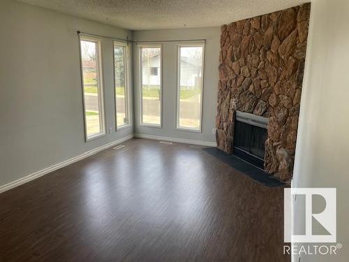 13832 28 Street, Edmonton, AB - Indoor Photo Showing Living Room With Fireplace