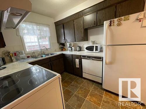 14617 106 Avenue, Edmonton, AB - Indoor Photo Showing Kitchen With Double Sink