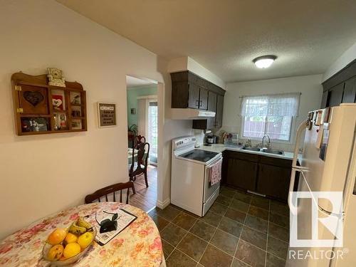 14617 106 Avenue, Edmonton, AB - Indoor Photo Showing Kitchen With Double Sink