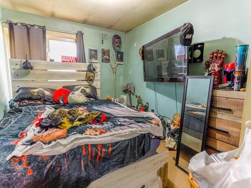 154 Roseland Village, Edmonton, AB - Indoor Photo Showing Bedroom