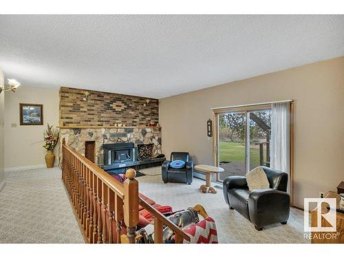 461037A Rge Rd 243, Rural Wetaskiwin County, AB - Indoor Photo Showing Living Room With Fireplace