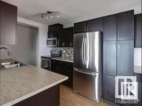 401 12331 Jasper Avenue, Edmonton, AB - Indoor Photo Showing Kitchen With Stainless Steel Kitchen