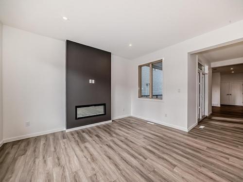 1401 Ainslie Wynd, Edmonton, AB - Indoor Photo Showing Living Room With Fireplace