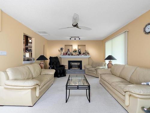 50352 Rge Rd 225, Rural Leduc County, AB - Indoor Photo Showing Living Room With Fireplace