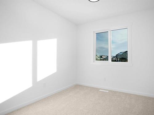 14 525 Secord Boulevard, Edmonton, AB - Indoor Photo Showing Other Room