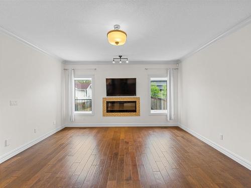 9654 83 Avenue, Edmonton, AB - Indoor Photo Showing Living Room With Fireplace