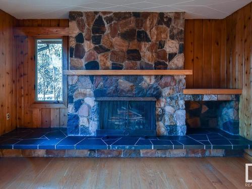 53203A Rge Rd 40A, Rural Parkland County, AB - Indoor Photo Showing Other Room With Fireplace