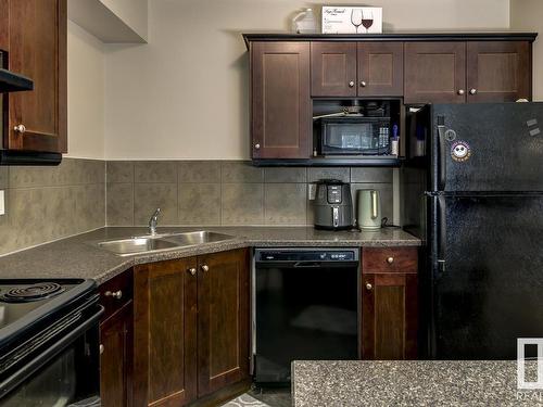 109 4415 48 Street, Leduc, AB - Indoor Photo Showing Kitchen With Double Sink