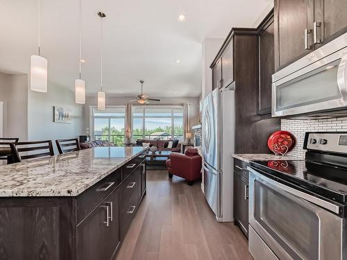 542 55101 Ste. Anne Trail, Rural Lac Ste. Anne County, AB - Indoor Photo Showing Kitchen With Upgraded Kitchen