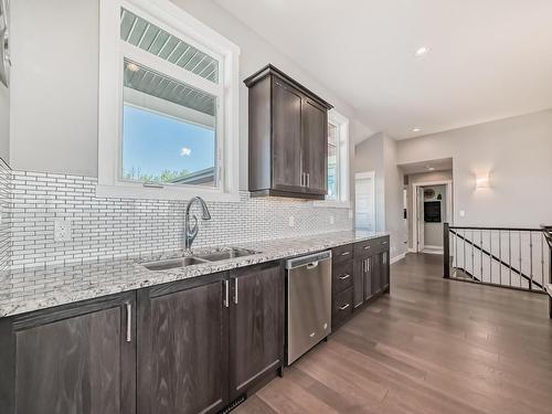 542 55101 Ste. Anne Trail, Rural Lac Ste. Anne County, AB - Indoor Photo Showing Kitchen With Double Sink With Upgraded Kitchen